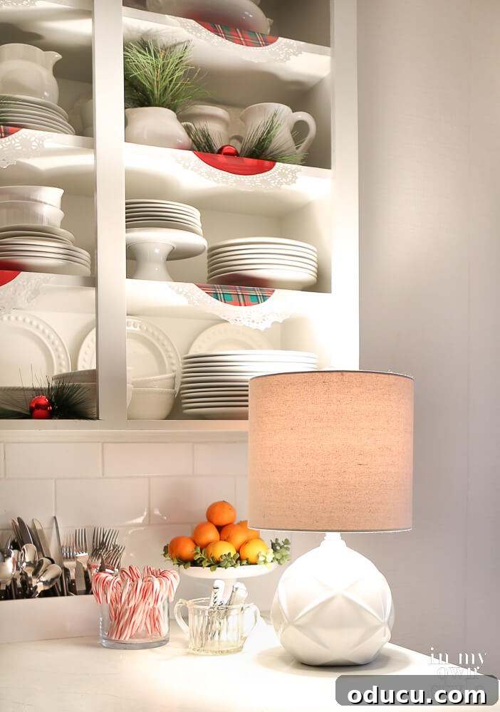 Small table lamp on kitchen counter to add warm and cozy feel.
