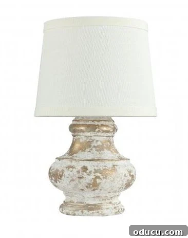 A small, elegant mini lamp illuminating a kitchen counter, creating a cozy atmosphere.