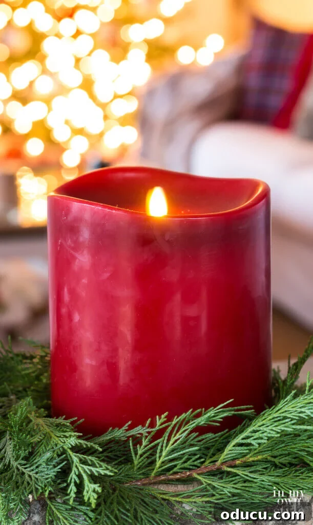 Effortless Christmas Table Wreath Crafts 3 Large red Christmas candle in a cedar wreath.