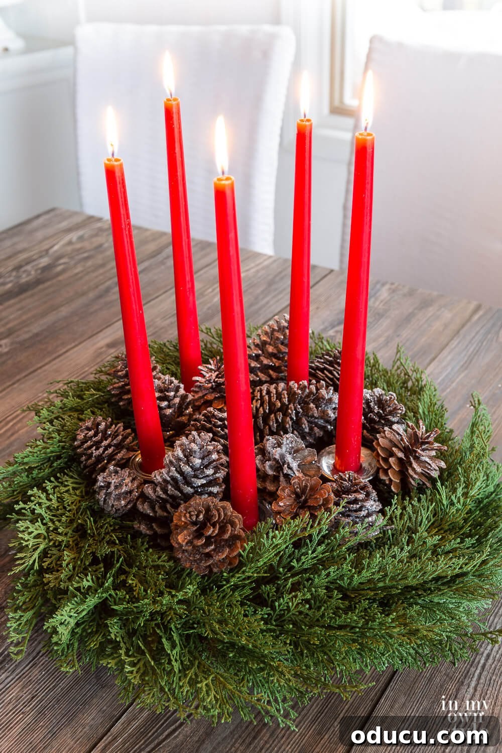 Decorating with Christmas Candles and pine cones