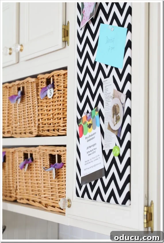 Brilliant DIY Strategies for a Perfectly Organized Home 14 DIY kitchen cabinet memo board made with fabric and foam board.