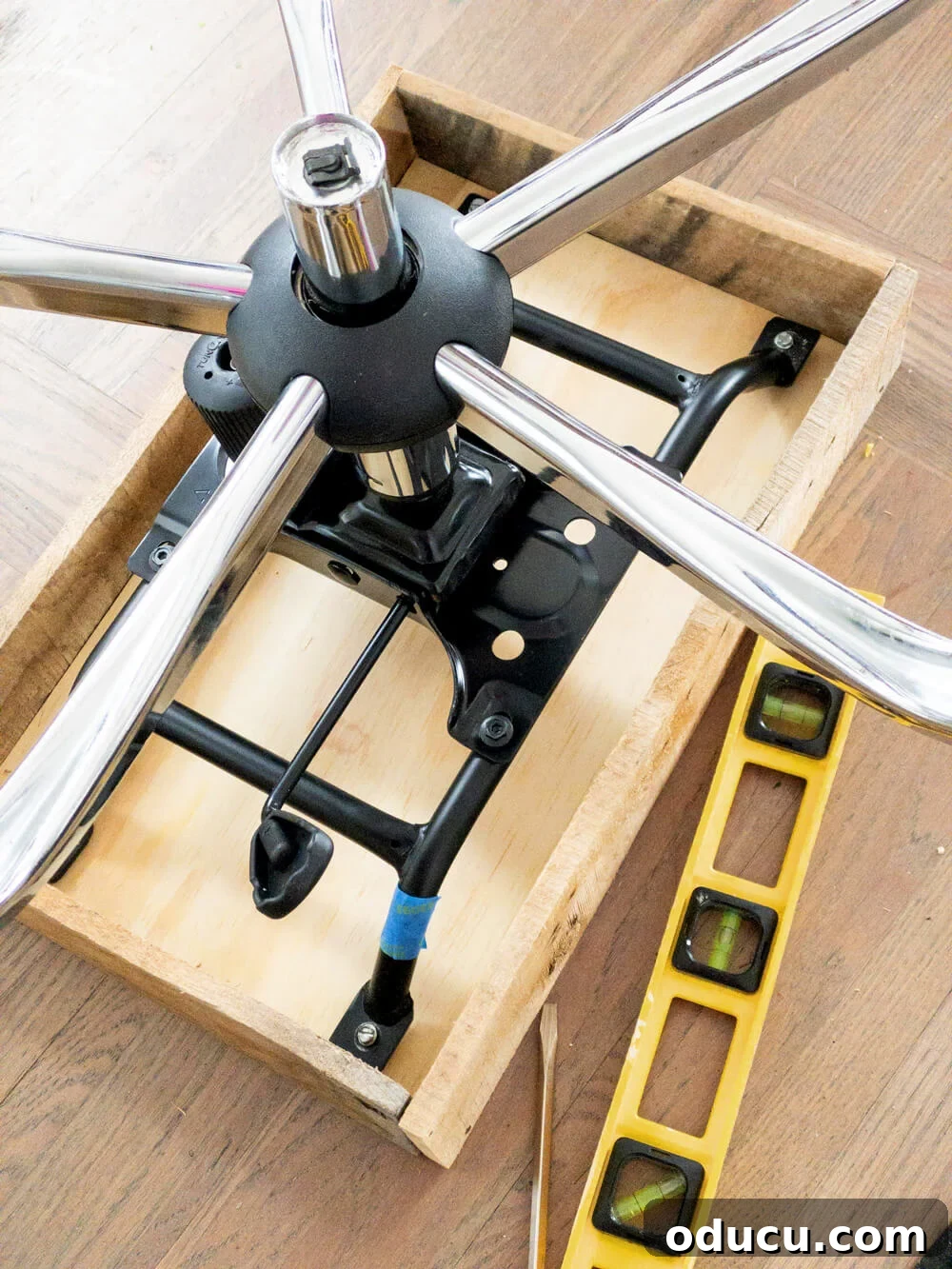 Creative File Solutions for Your Home Workspace 14 Attaching the base of an office chair to a wood box to make to hold a file folder organizer.