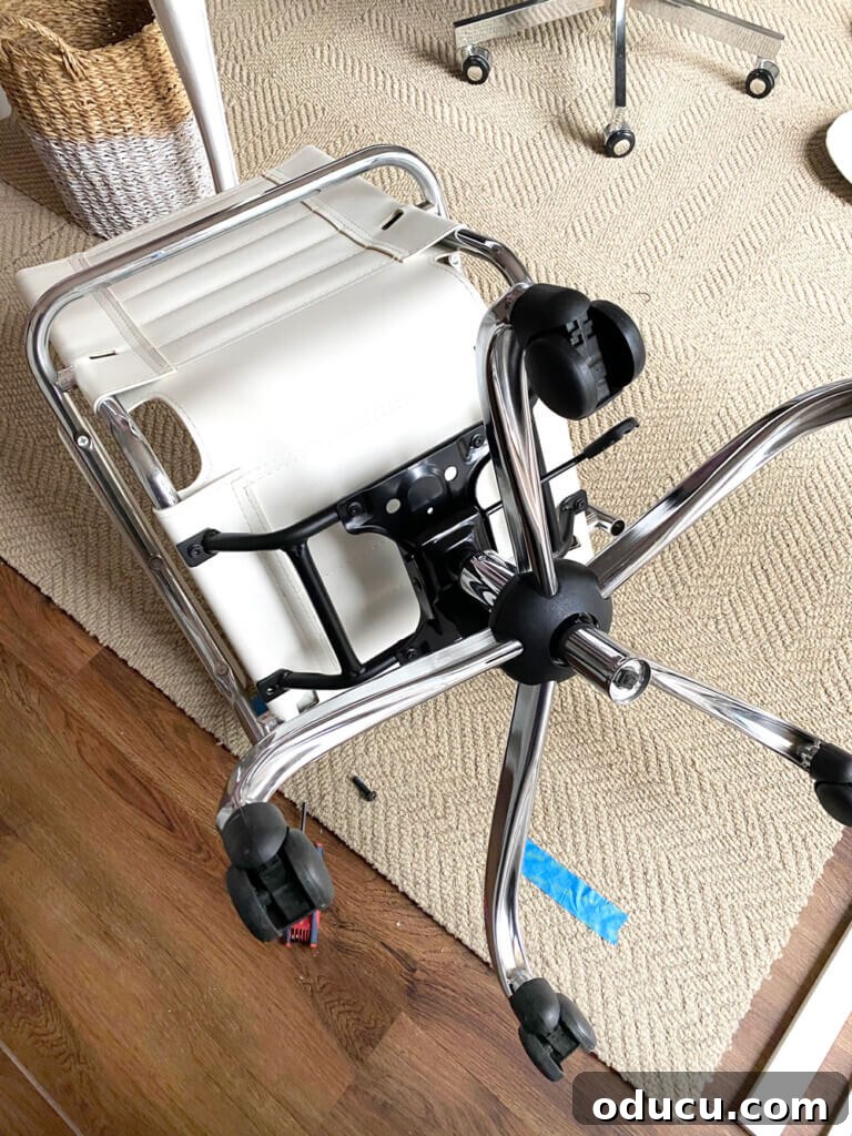 Creative File Solutions for Your Home Workspace 7 Repurposing an office chair base for a mobile hanging file folder organizer.