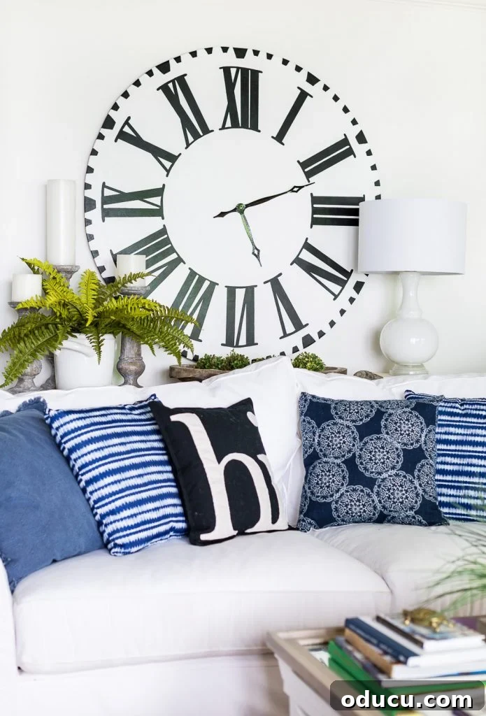 The Evolution of My Living Room Style 12 Clock on wall in blue and white decorated living room