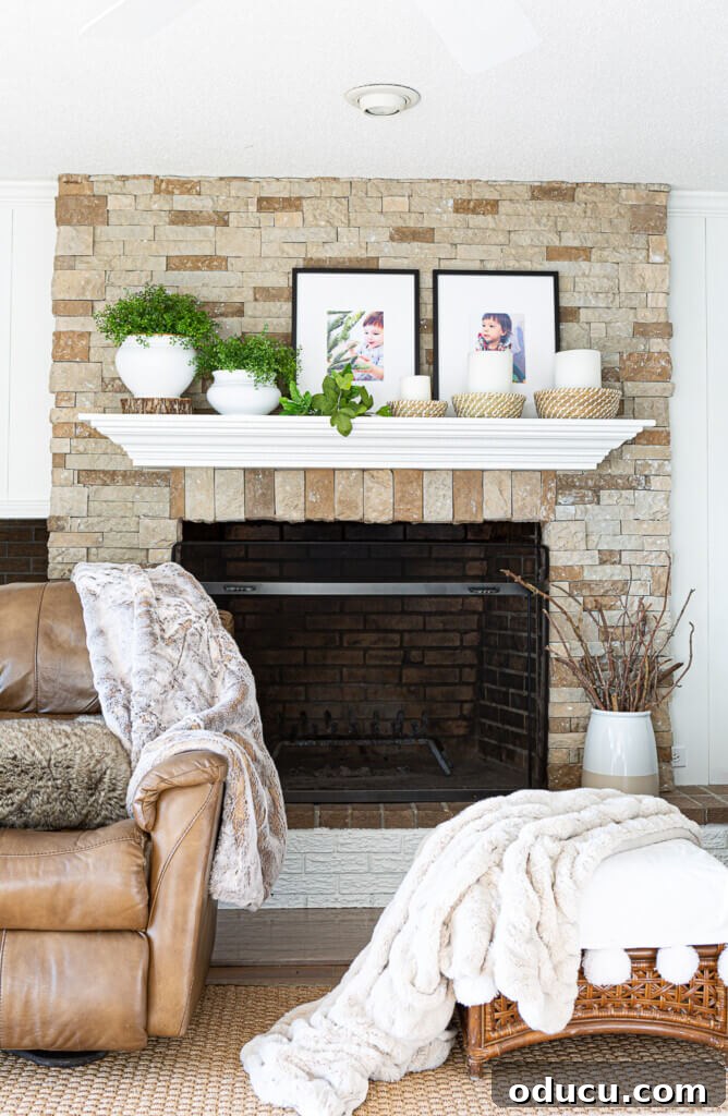 The Evolution of My Living Room Style 19 Fireplace decorated for the winter months.