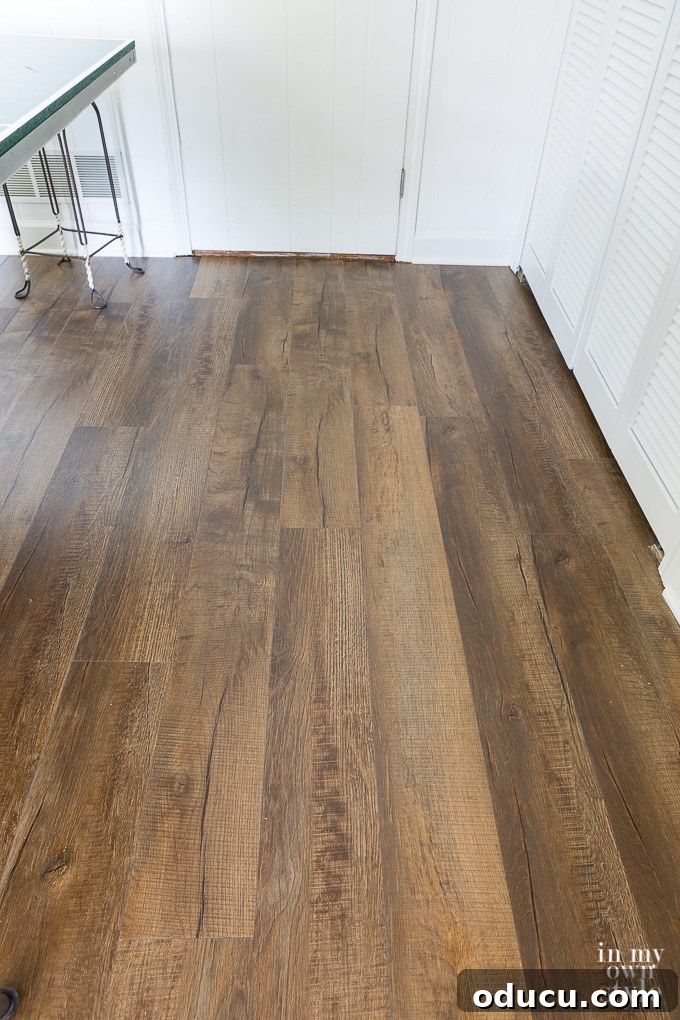My Love Affair with Resilient Flooring Understanding Its Enduring Appeal 4 Tarkett Luxury Vinyl Plank Flooring on a game room floor