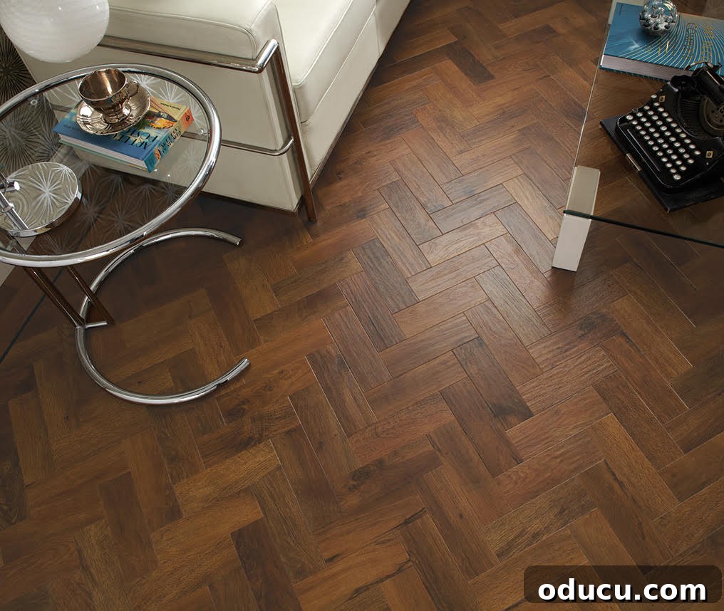 My Love Affair with Resilient Flooring Understanding Its Enduring Appeal 10 Herringbone design on resilient floor of luxury vinyl plank.