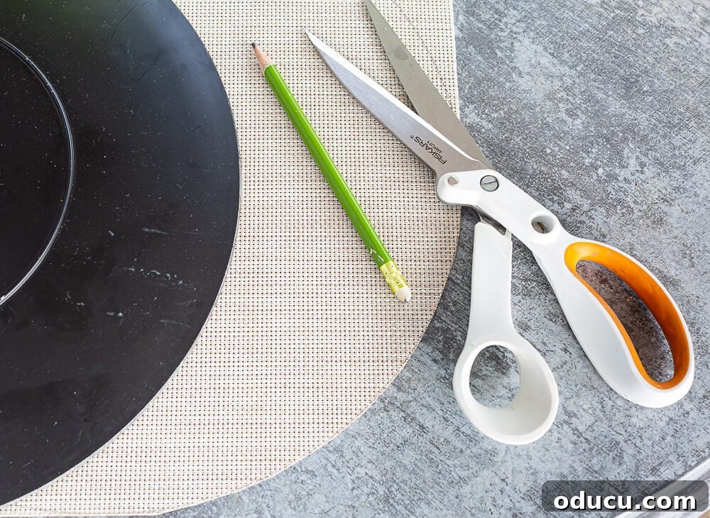 How to make a round template and cut a woven placemat to make it round.