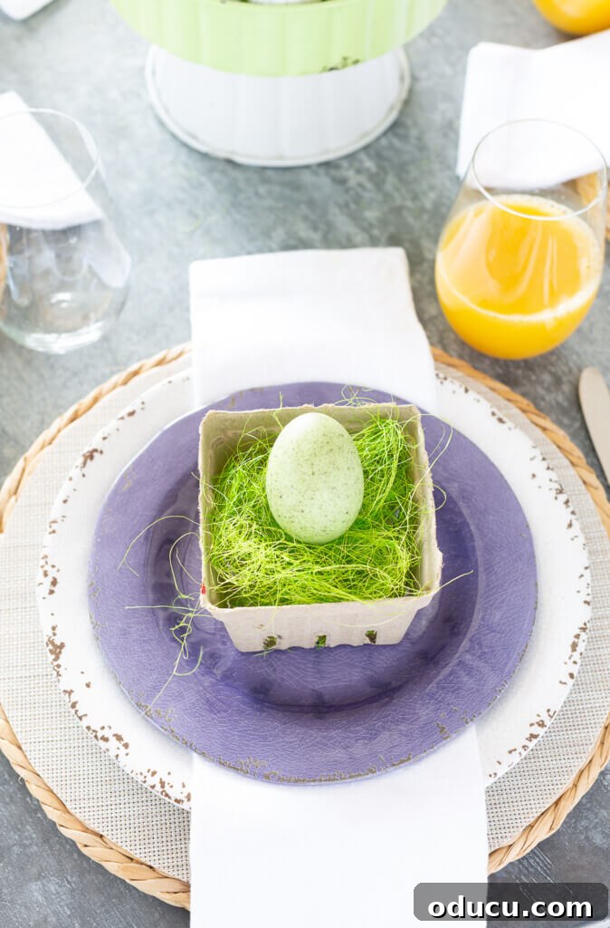 Easter brunch table setting using white and purple dinner plates.
