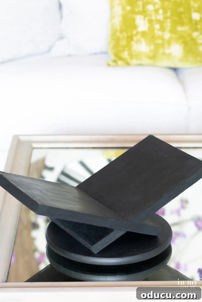 Finished Pottery Barn hack of an open book holder in black.