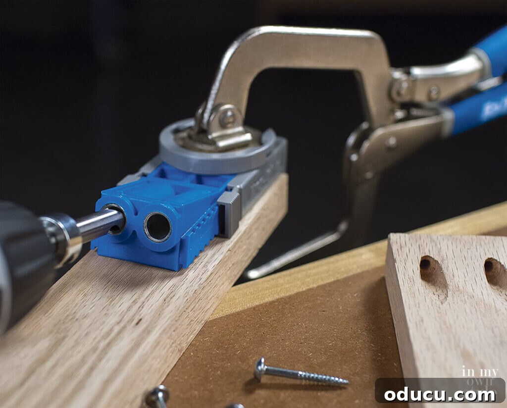 Crafting a Custom Round Wood Kitchen Tabletop 13 a Kreg jig and clamp showing how pocket holes are made in wood.