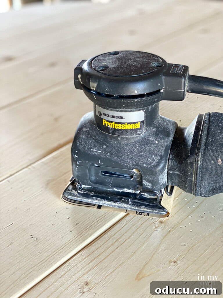 Crafting a Custom Round Wood Kitchen Tabletop 21 palm sander