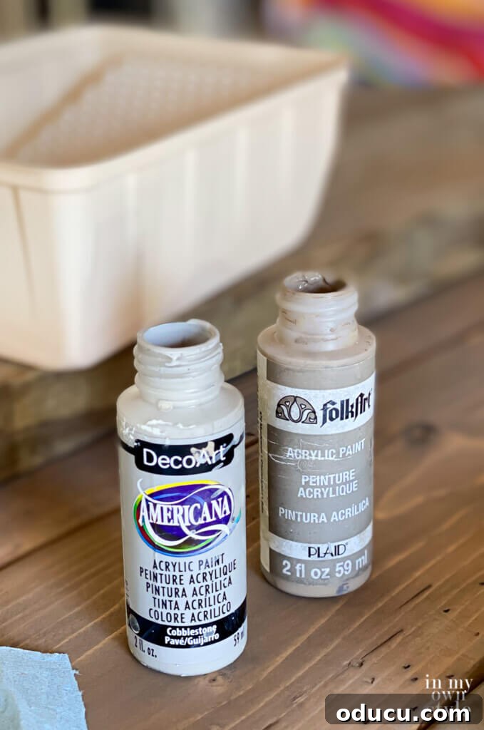 Crafting a Custom Round Wood Kitchen Tabletop 27 grey craft paints used to add a grey wash over a stained DIY round wood table top.