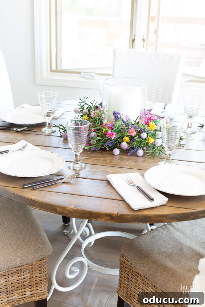 Crafting a Custom Round Wood Kitchen Tabletop 31 Completed DIY round wood table top set for dinner.
