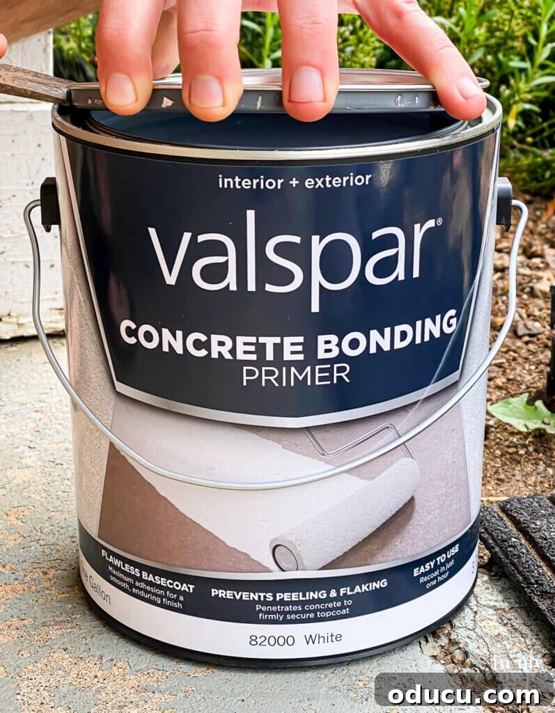 Transform Your Concrete Porch or Patio with Paint and Stencils 5 What to use before painting a concrete porch or patio floor. Valspar Concrete bonding primer.