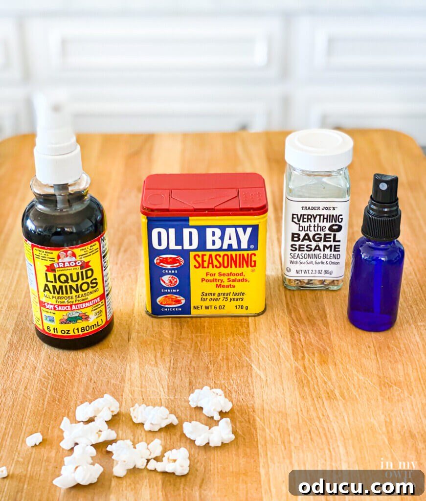 A selection of low-salt seasoning options for air-popped popcorn, including Bragg Liquid Aminos, Old Bay Seasoning, and various spices, offering delicious ways to enhance flavor while managing sodium intake.