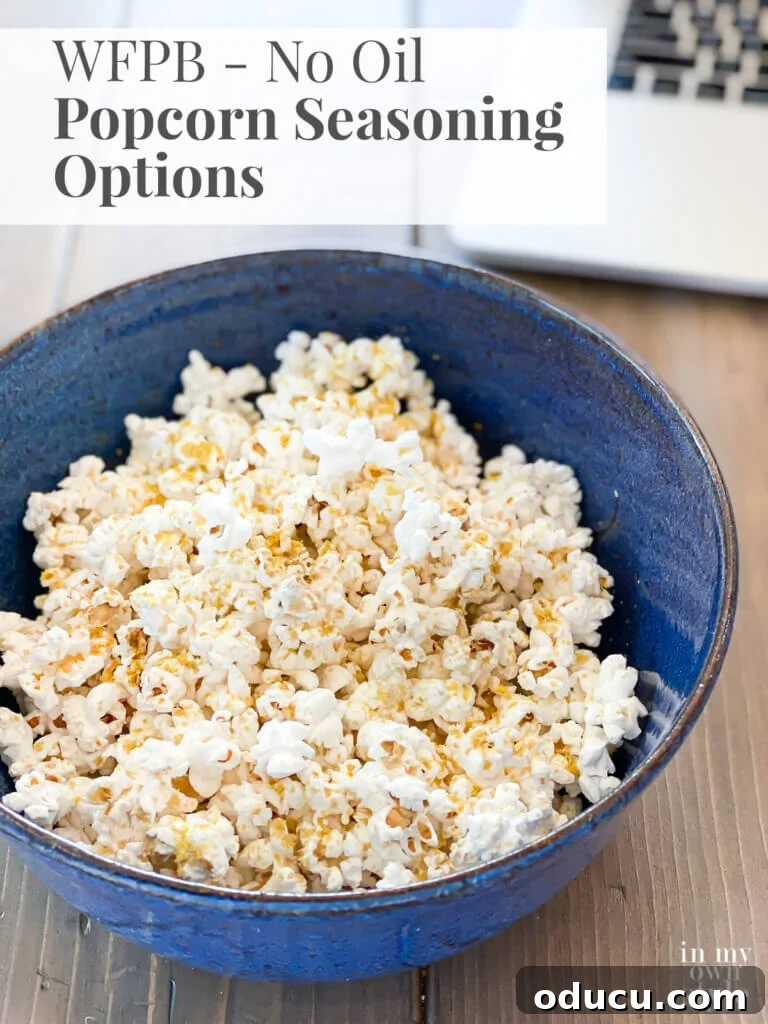 A vibrant bowl of oil-free, air-popped popcorn topped with plant-based seasonings, accompanied by text overlay highlighting 'WFPB No Oil Popcorn Seasoning Options' as a healthy snack alternative.