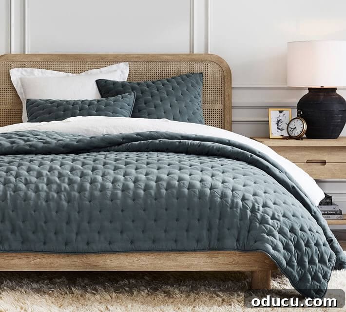 Personalize Your Sanctuary: Mix & Match Bedding 12 Pillow styling on a bed using an odd number of pillows.