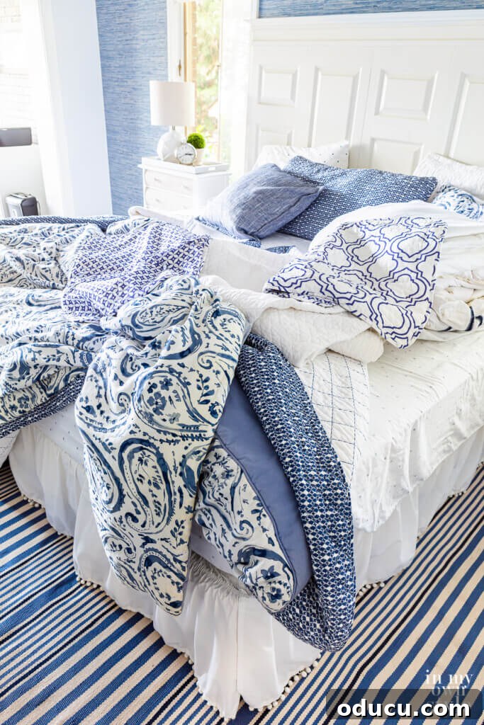 Personalize Your Sanctuary: Mix & Match Bedding 7 Blue and white bedding getting mixed and matched to create a new look for the season.