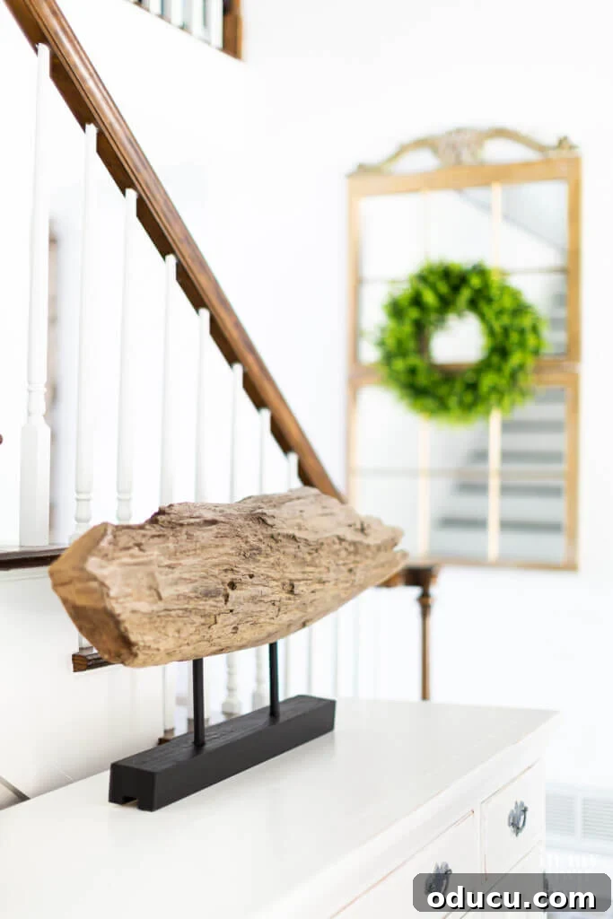 Craft a Natural Driftwood Art Display 7 Guide on how to make modern art from a found wood log, illustrating the simple process of creating elegant home decor.