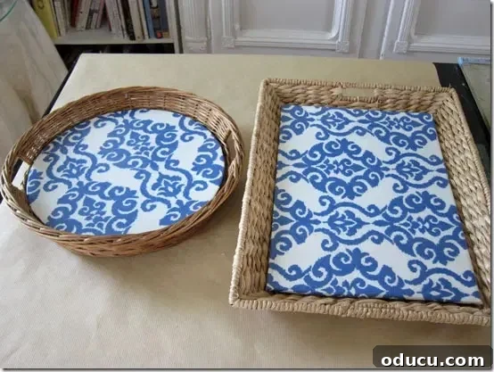 Crafting Versatile Serving Trays for Every Occasion 7 Two wicker basket trays with matching blue and white decorative fabric inserts, showcasing a cohesive look.