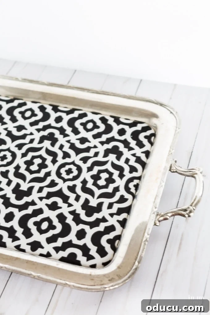 Crafting Versatile Serving Trays for Every Occasion 9 Patterned fabric lined silver tray, demonstrating a decorative insert without vinyl lamination.