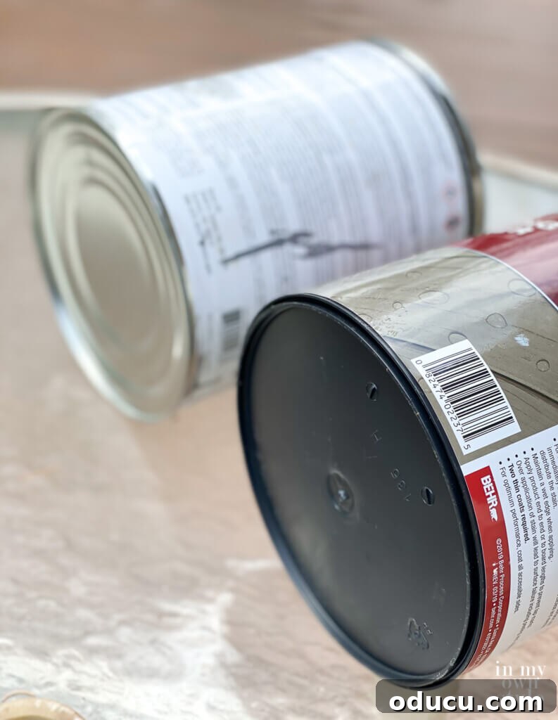 Handmade Modern Canvas Masterpiece 5 Bottom rims of gallon paint cans. One is metal, the other plastic.