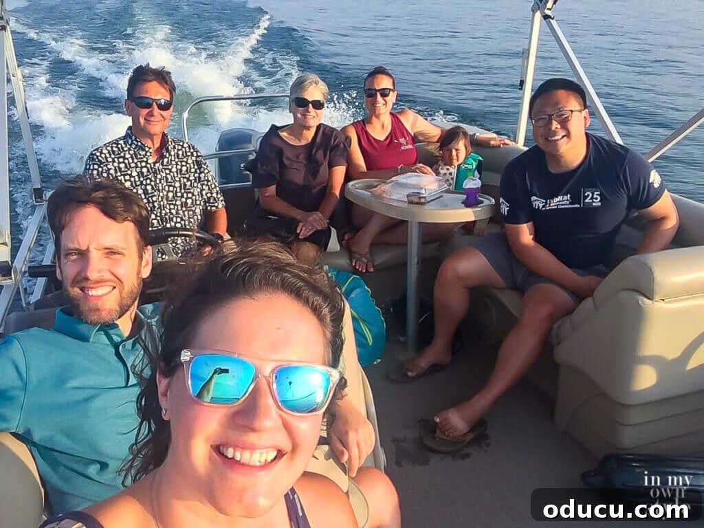 Style Scouting Forty Seven 2 Family enjoying a day boating on Lake Murray, SC, with clear skies and calm waters.
