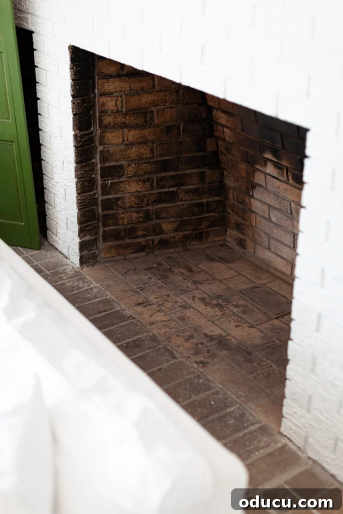 DIY Fireplace Cover Seamlessly Built 2 Elegant DIY fireplace cover made from a cardboard screen, perfect for summer decor.