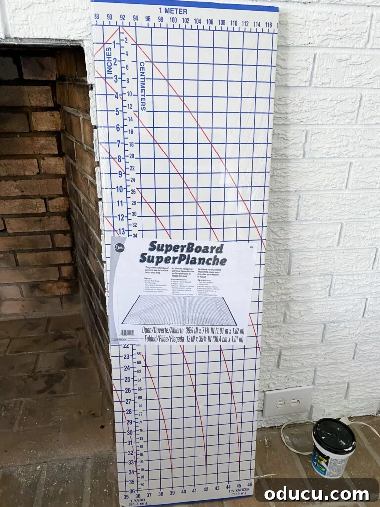 DIY Fireplace Cover Seamlessly Built 3 SuperBoard from Dritz leaning against a wall, ready to be transformed into a DIY fireplace screen.