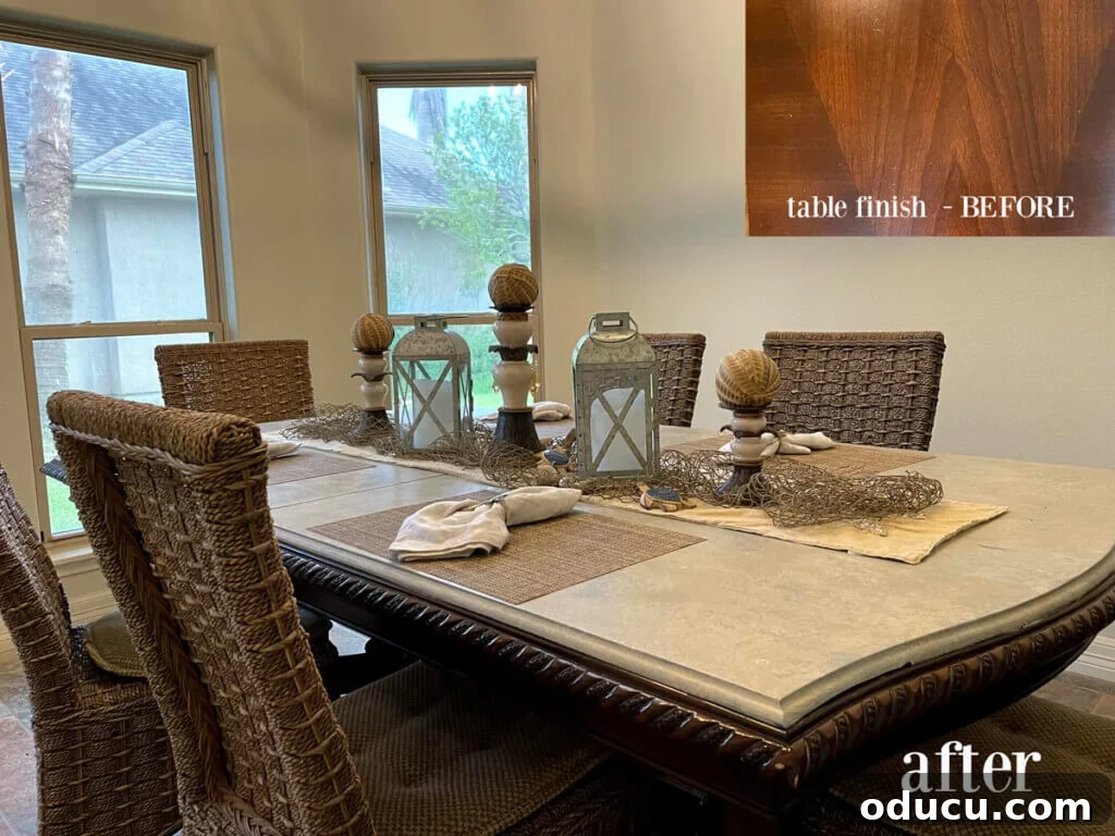 Dining room table beautifully faux painted to achieve a realistic zinc finish.