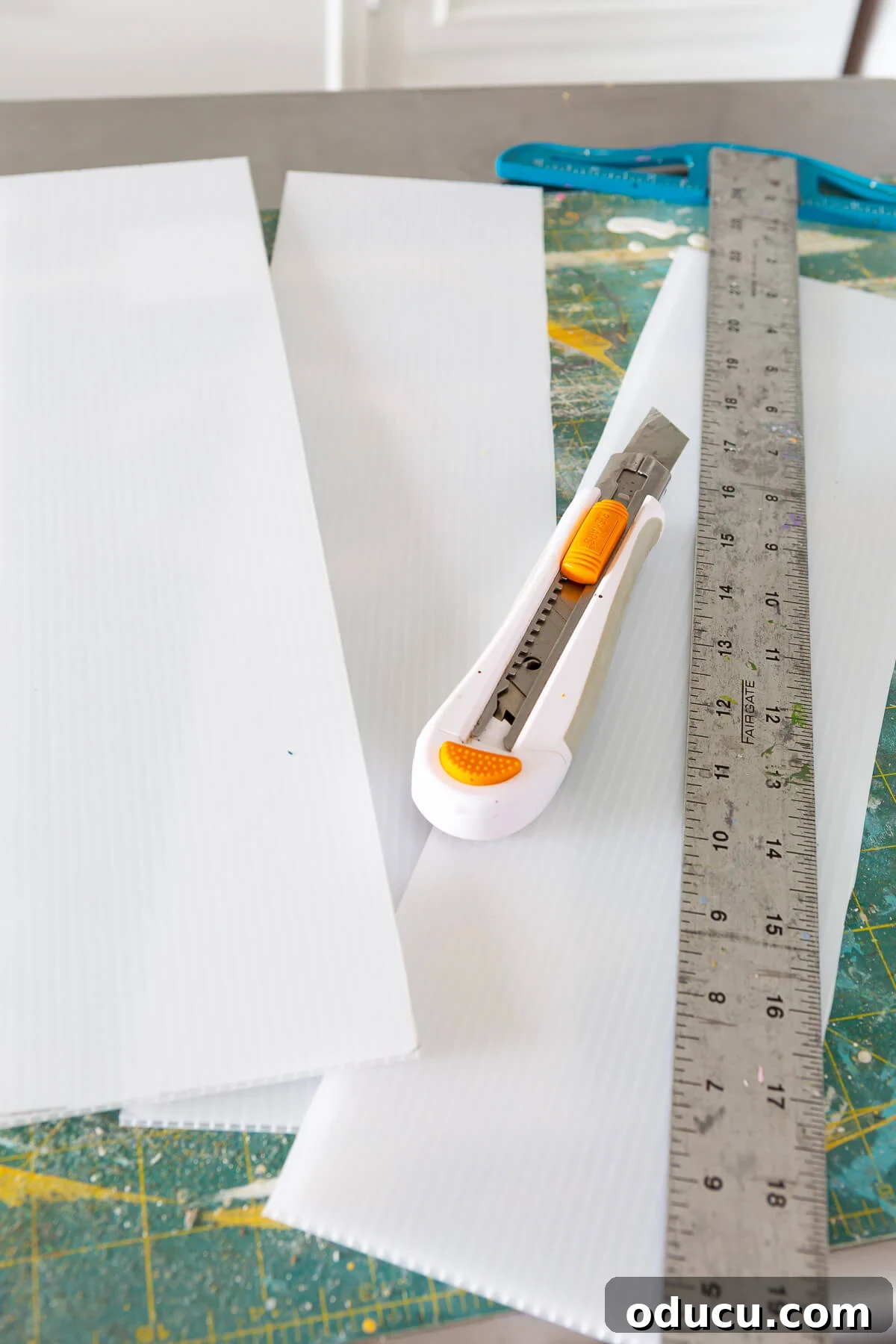 DIY Freezer Drawer Organization Hacks 8 Plastic corrugated sheets cut using a craft knife and t-square.