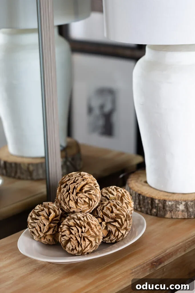 Cozy Fall Living Room on a Dime 5 pictures of cozy homes - pinecone balls on a table.