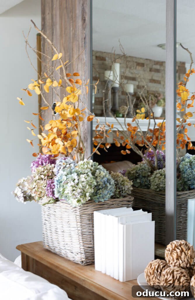 Cozy Fall Living Room on a Dime 7 Dried hydrangeas in a basket for cozy living room for fall.