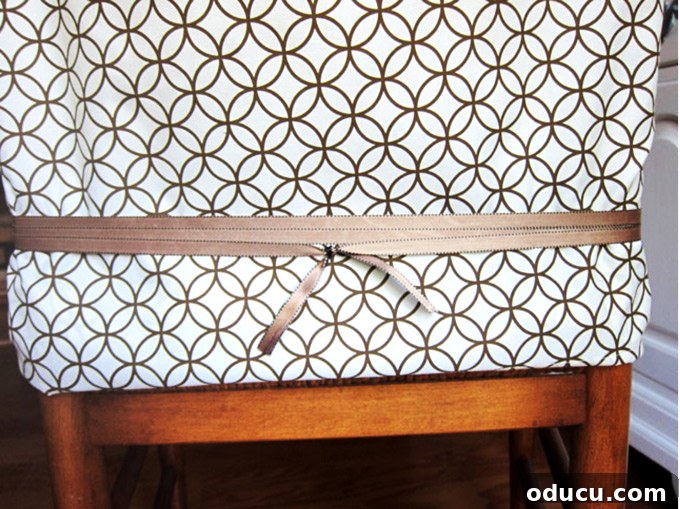 Pillowcase Chair Cover Hack: No Sewing Required! 8 Ribbon tied around a dining room chair back