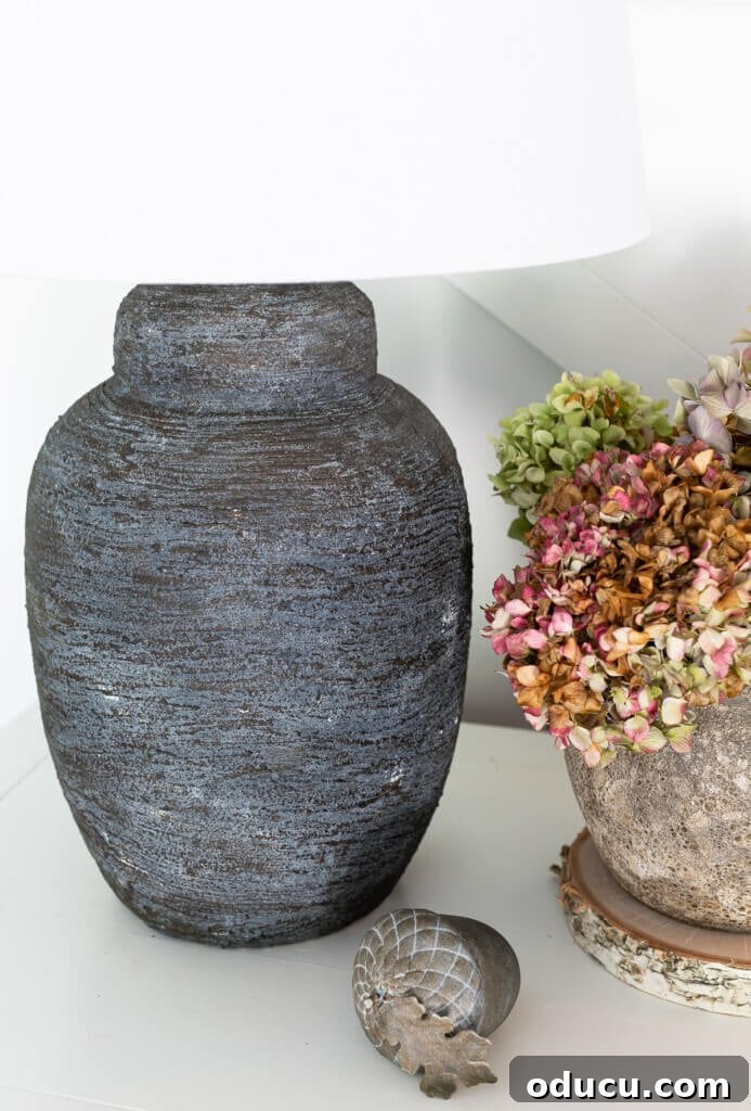 Craft Stunning Table Lamps for Less 2 Foyer table lamp DIY on a table with fall decor.