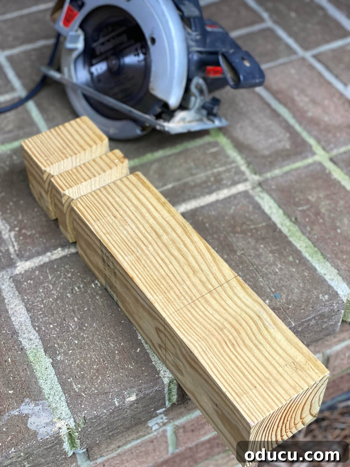 4 x 4 wood post scrap readied to be cut to make DIY wooden candle holders