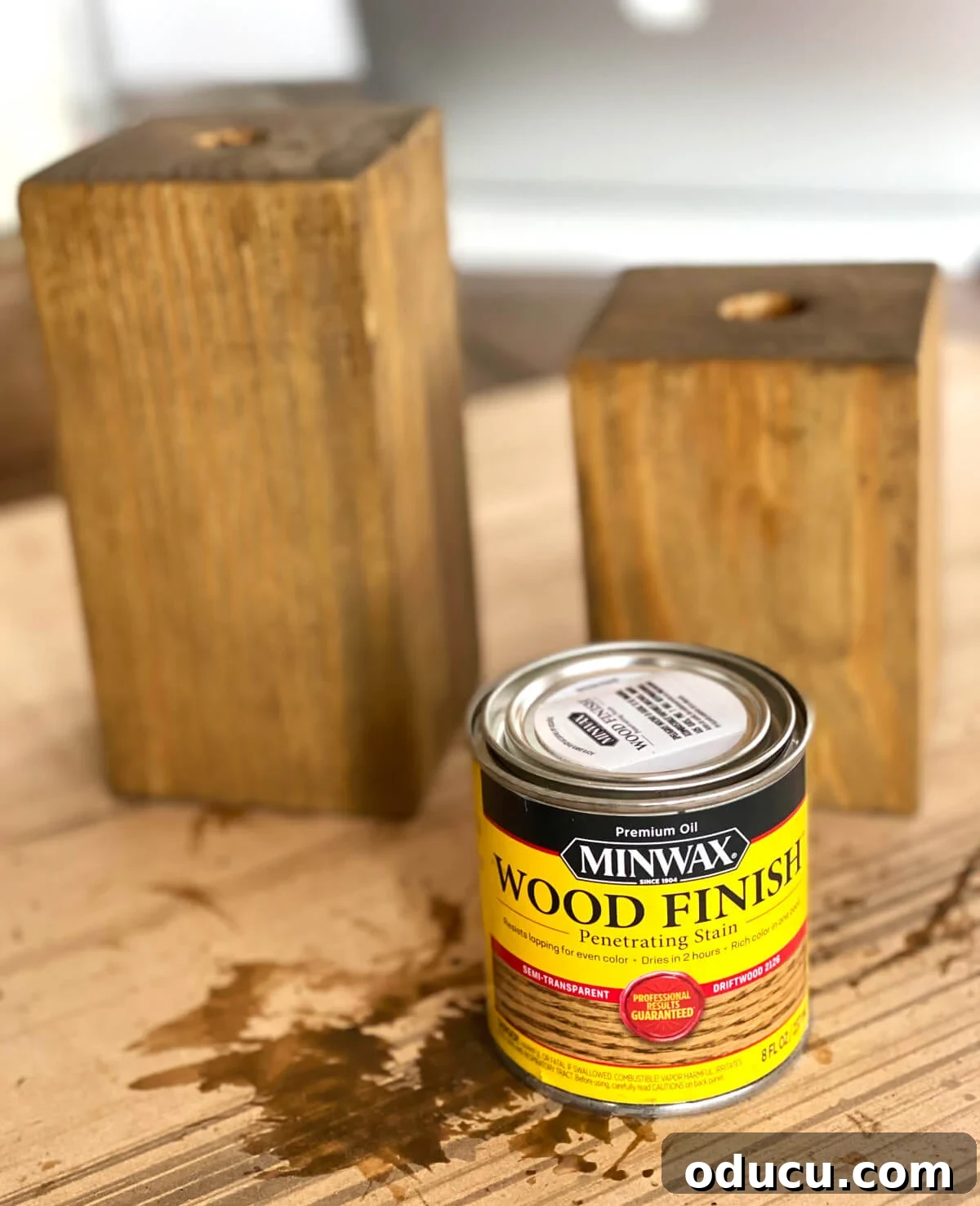 4 x 4 wood post scraps stained and holes drilled. Minwax wood finish stain can.