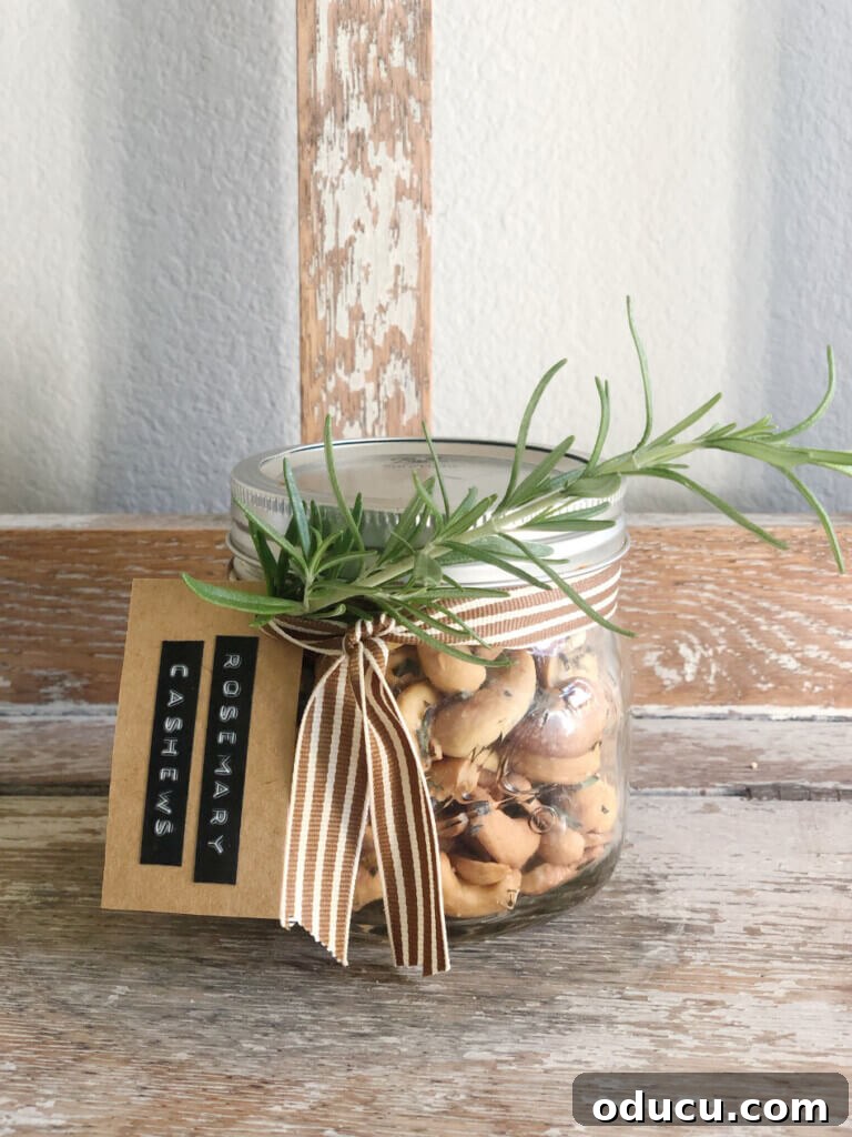 Fashion Reconnaissance 2 Delicious Rosemary Cashews in a jar with a handmade gift tag, perfect for a thoughtful holiday present.
