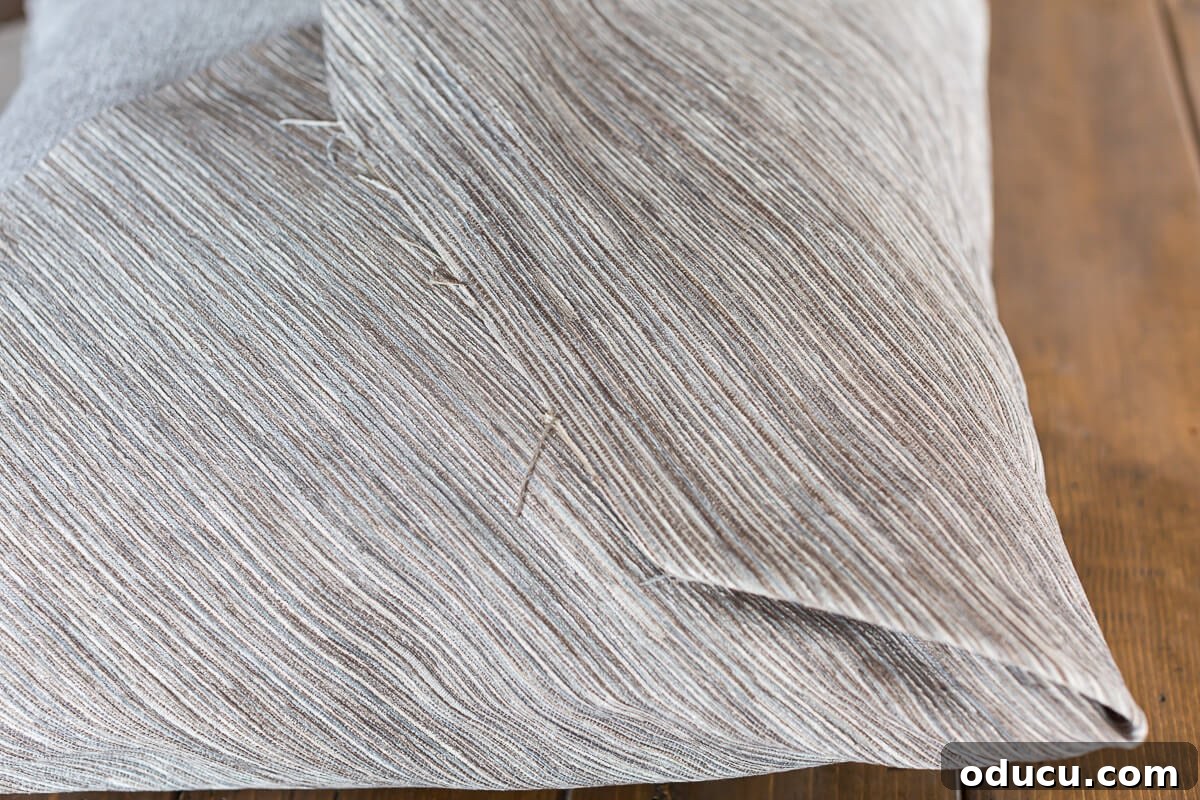 raw edge on fabric wrapped pillow