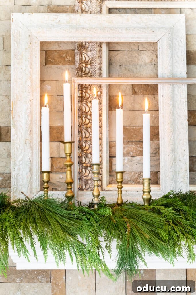 Trend Spotting Volume 70 2 A group of brass candlesticks and white candles on mantel decorated for Christmas
