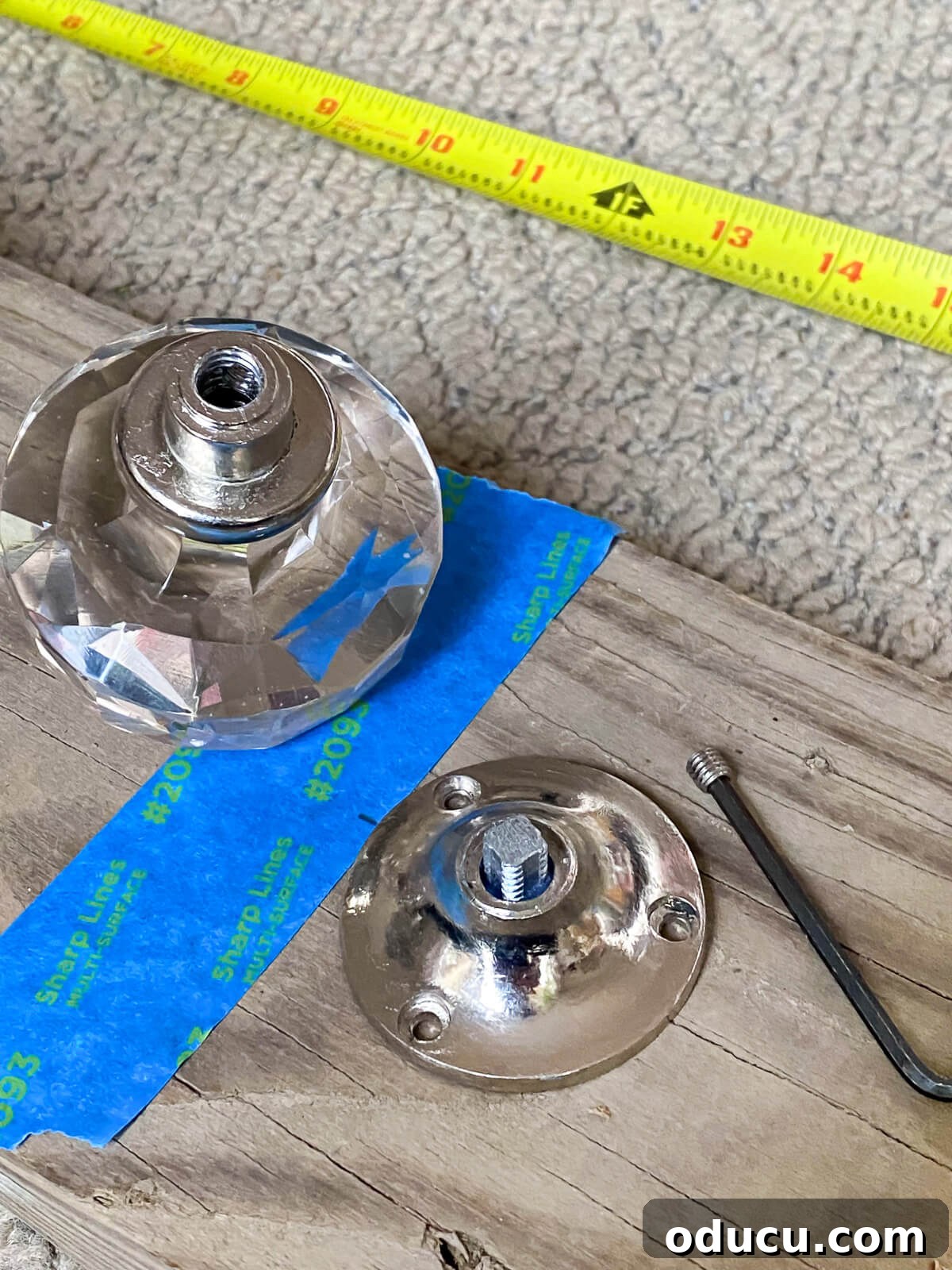 How to attach glass door knob to wood board to make a blanket holder for a living room.