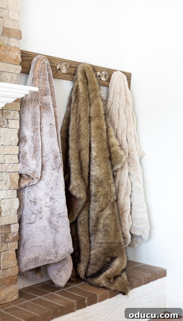 Elegant Wall Organizer for Living Room Throws 3 Living room blanket storage idea - use doorknobs on a Shaker style peg wall rack.
