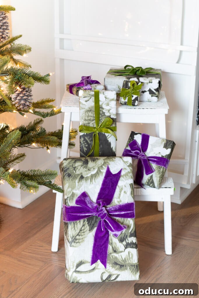 Festive Without the Fuss: Our Christmas Home Tour 23 Beautifully wrapped Christmas gifts, tied with vintage purple ribbons, displayed on a charming stool.