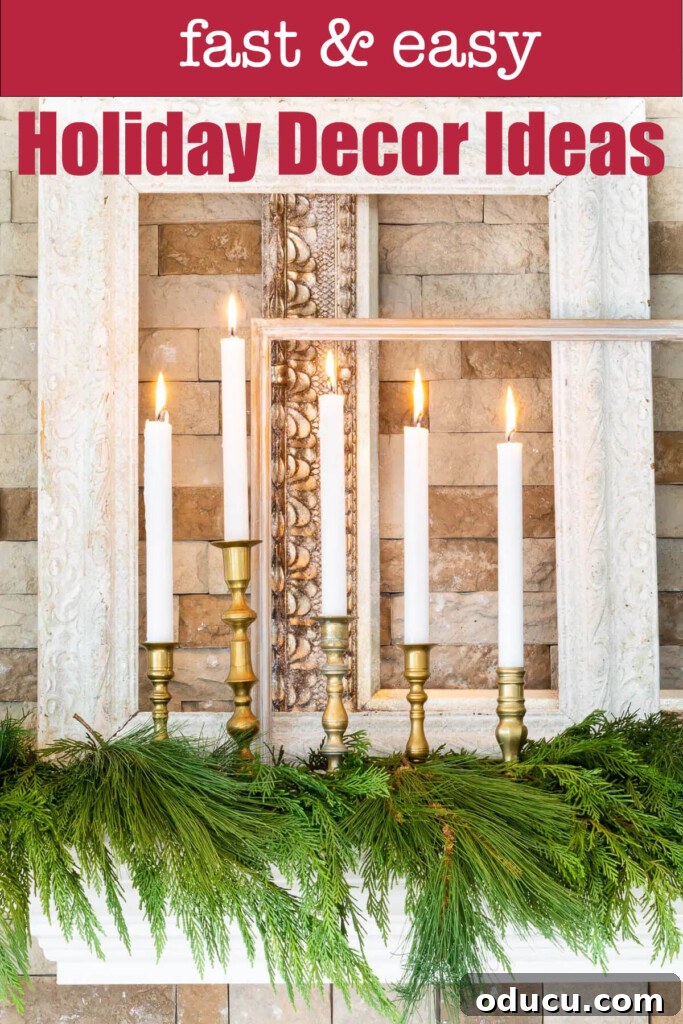 Festive Without the Fuss: Our Christmas Home Tour 26 White taper candles in brass holders on a pine covered mantel. Text overlay says fast and easy holiday decor ideas.