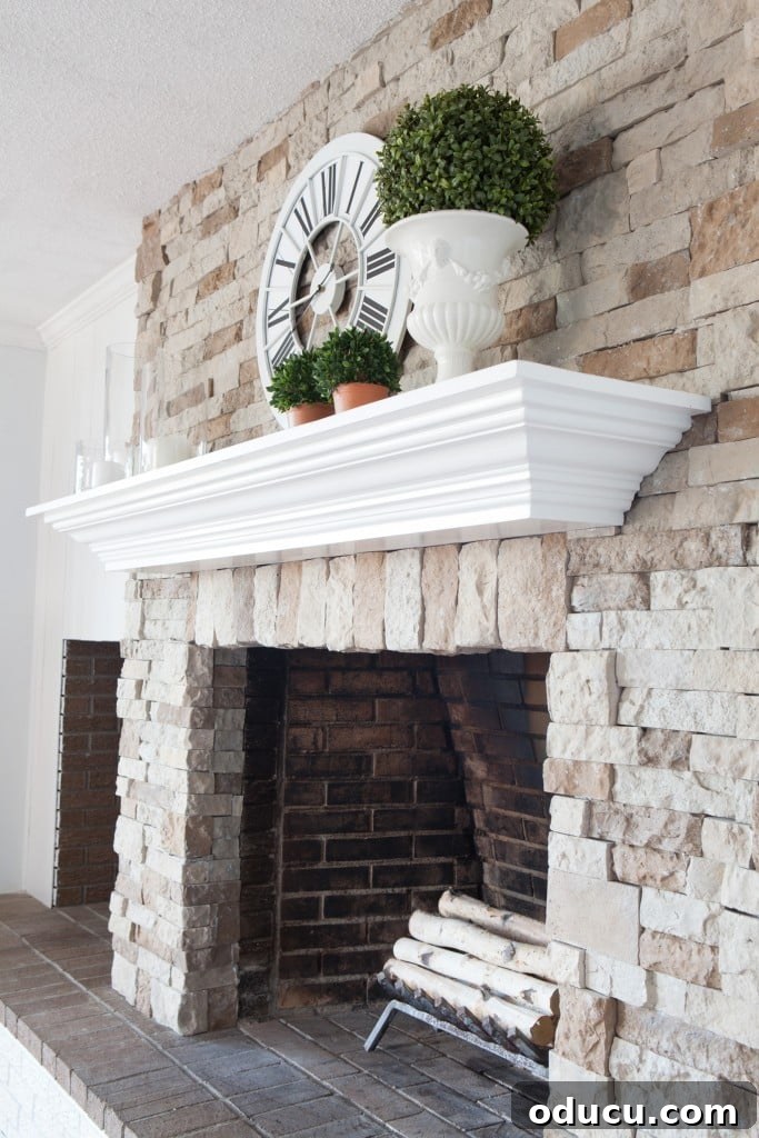 Tearing Out Your Stone Fireplace 4 Previously repurposed furniture top serving as a fireplace mantel