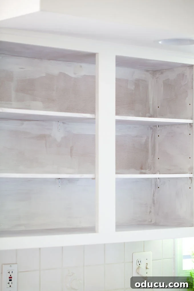 Open Kitchen Shelving: Cabinet Door Removal 19 How to paint laminate surfaces. I always use Gripper. It is the best primer over shiny surfaces.