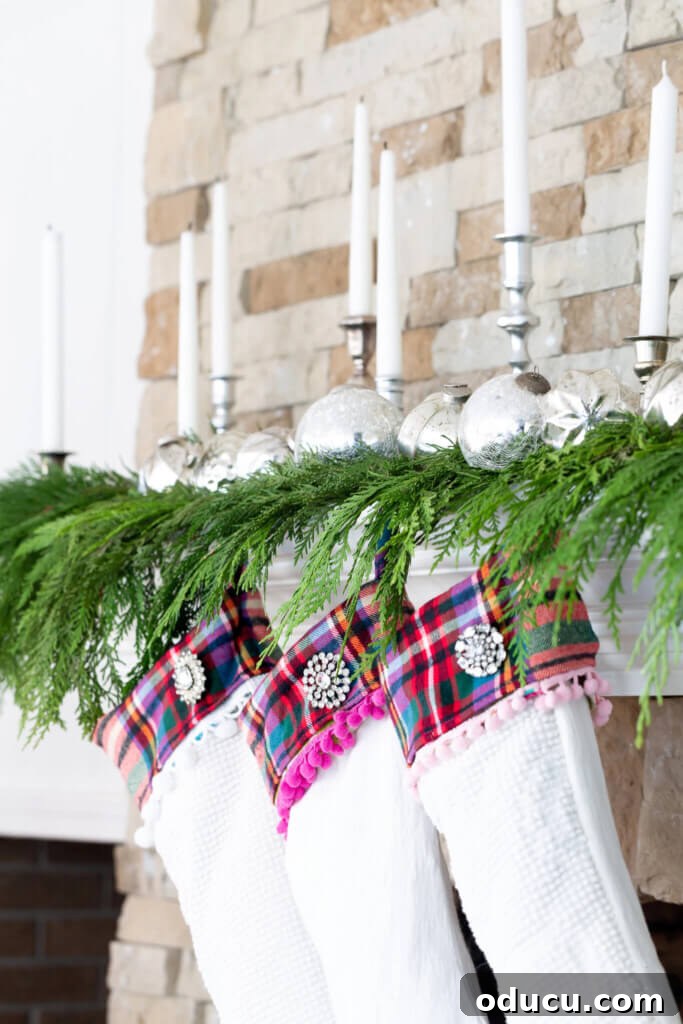 Unlock New Decor Ideas for Candle Holders 18 A festive Christmas plaid candlelit mantel, artfully decorated using painted candlesticks and framed art.