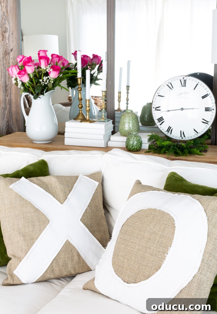 Craft Personalized XO Applique Pillows 4 Stylish X and O throw pillows beautifully arranged on a sofa, adding a personalized touch to the decor.
