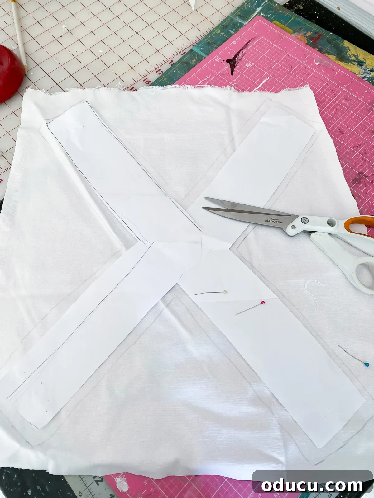 The process of transferring a template onto fabric, a key step for creating a beautiful applique pillow.